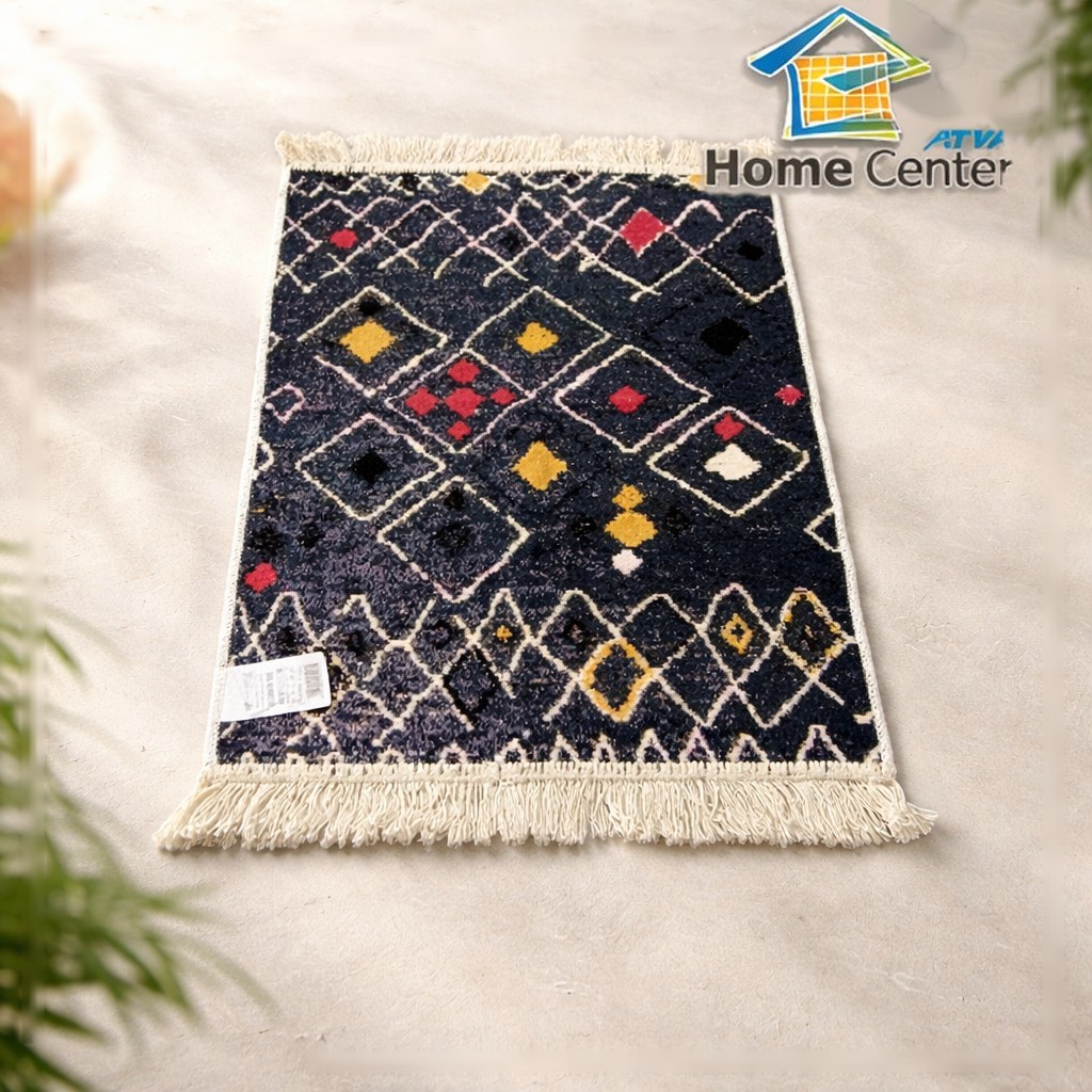 Bohemian geometric rug on stone surface
